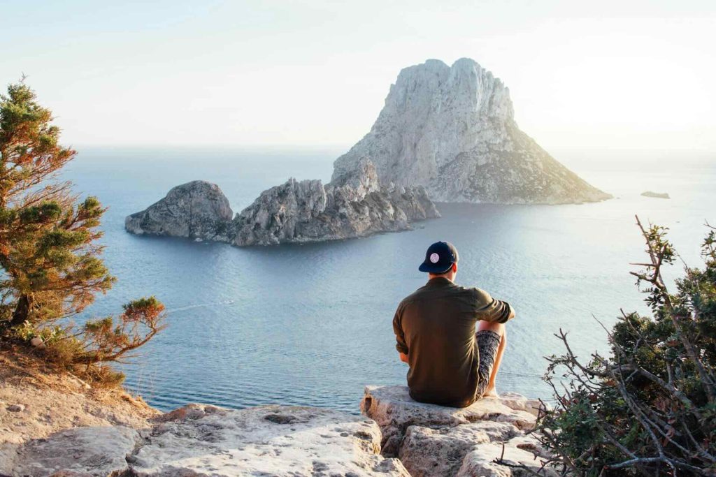 Man sitting down outdoors