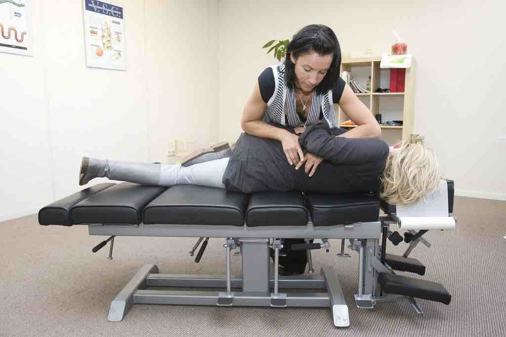Picture of a chiropractor working on a patient