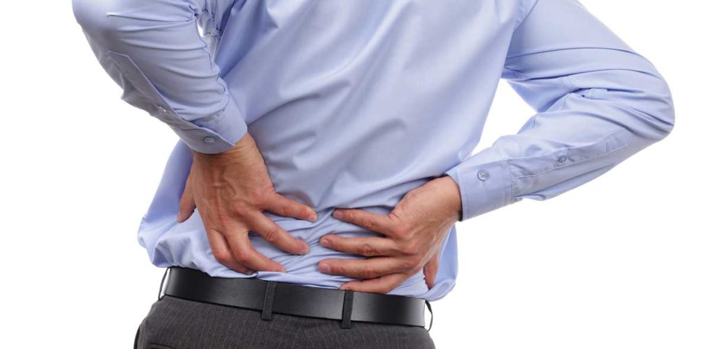 Man holding his lower back due to pain