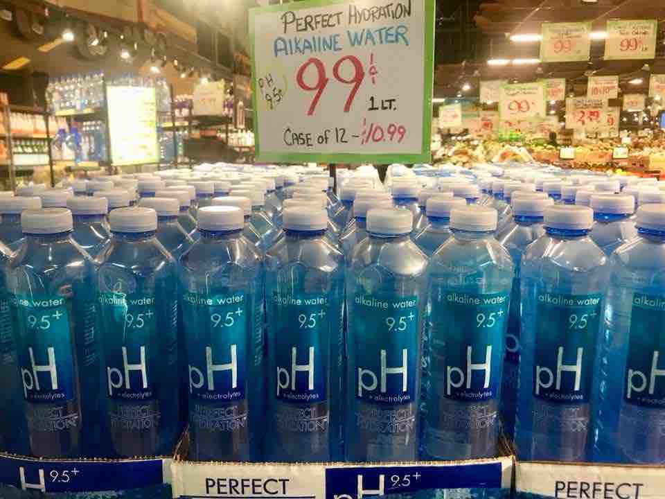 Picture of an alkaline water sales display at a grocery store
