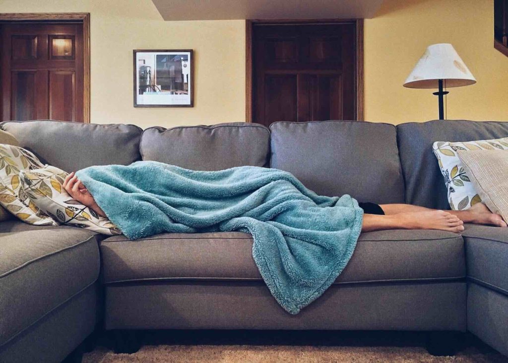 Woman sleeping on the couch