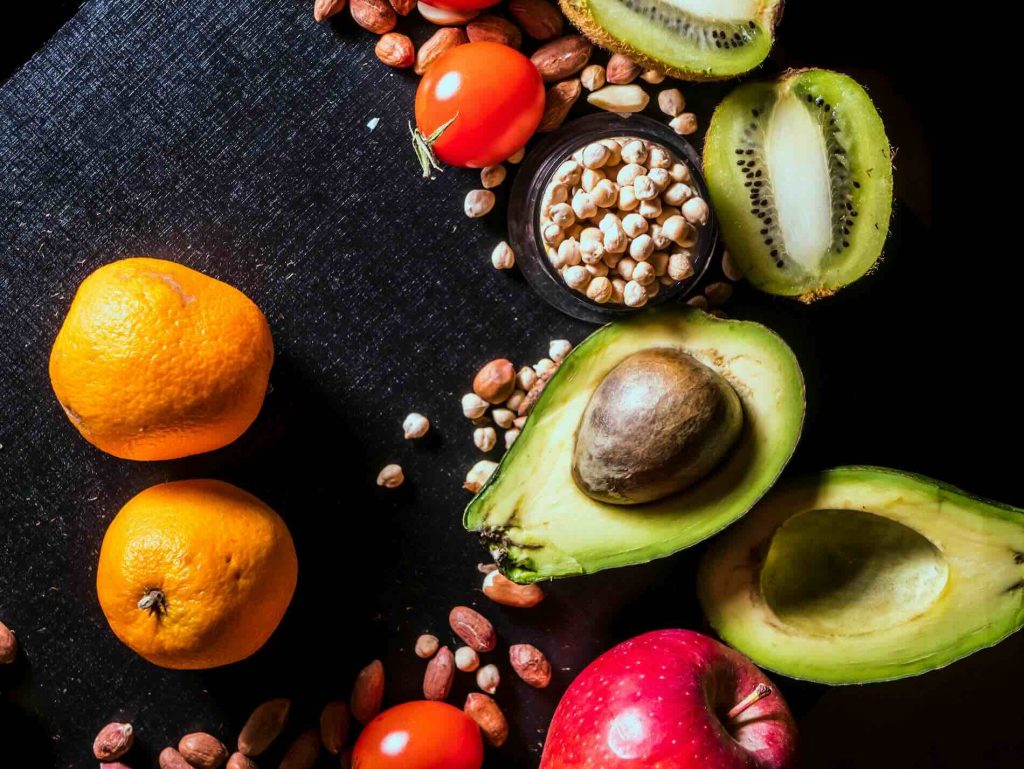 Picture of keto-compatible foods like avocado, nuts, etc