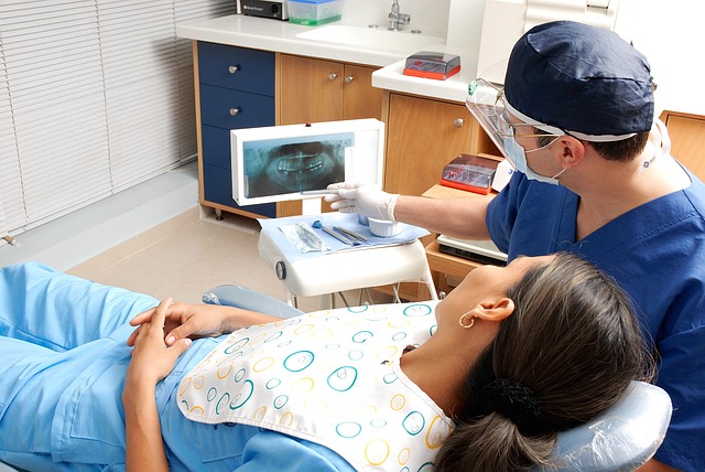 Dentist showing a patient an x-ray