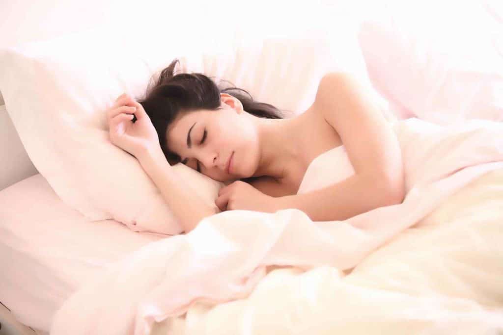 Woman sleeping on a comfortable mattress