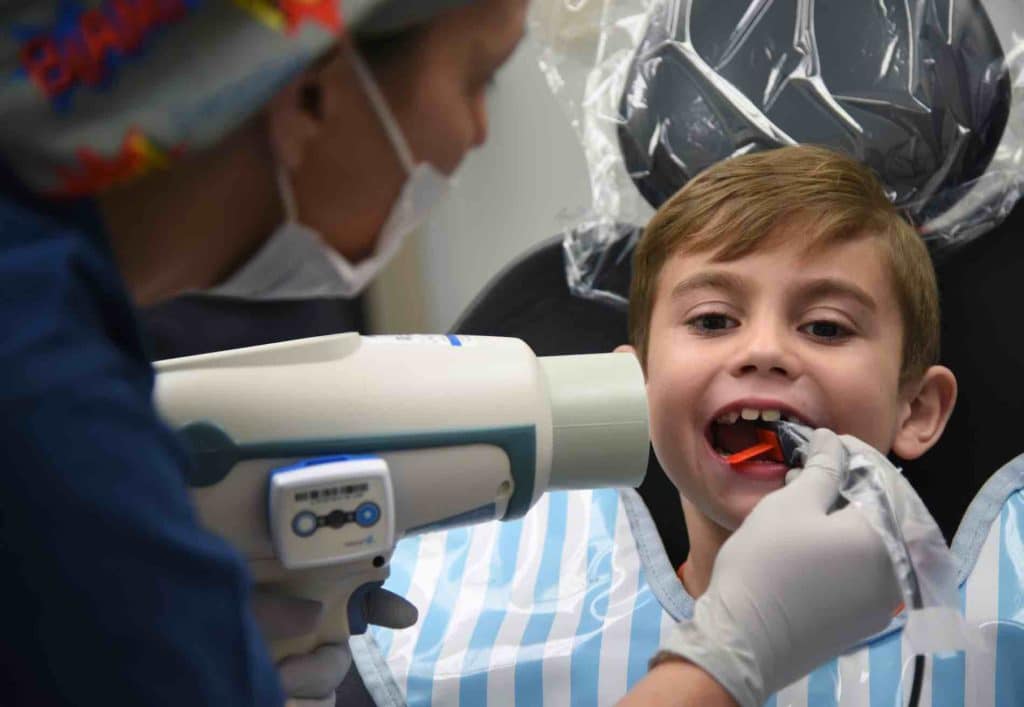 Child getting an x-ray at the dentist