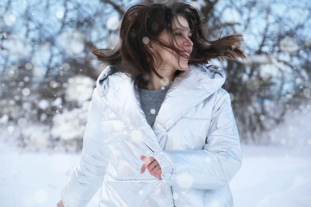 Woman outside in a snowy area