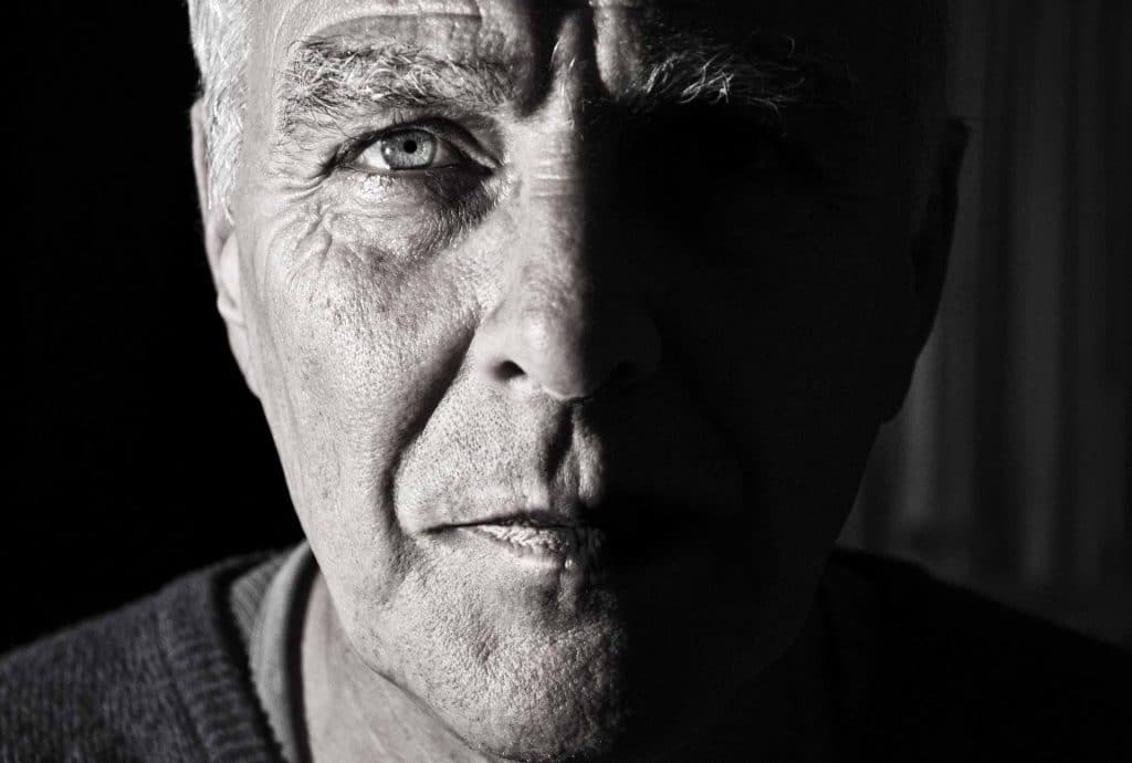 Black and white photo of an older man with healthy eyes