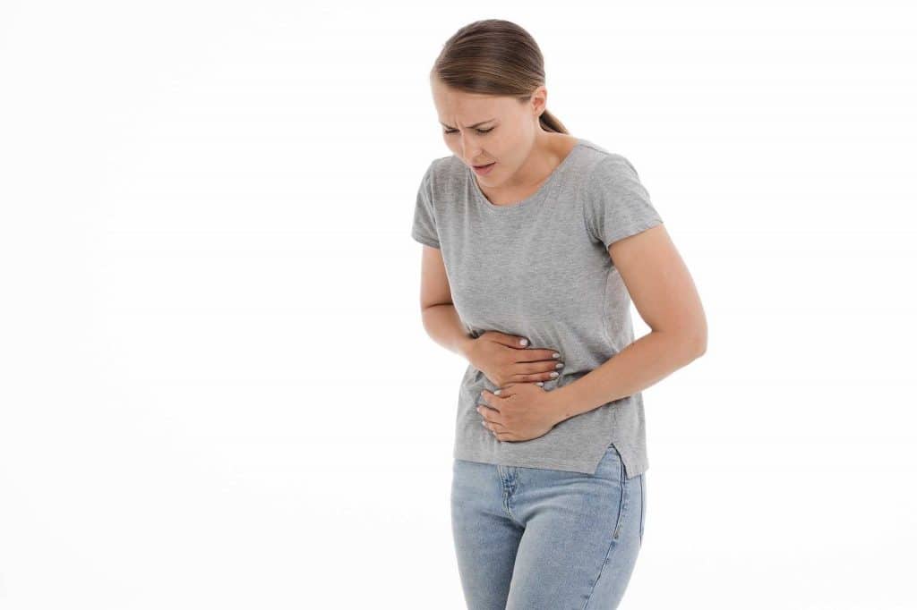 Woman suffering from abdominal pain from her period