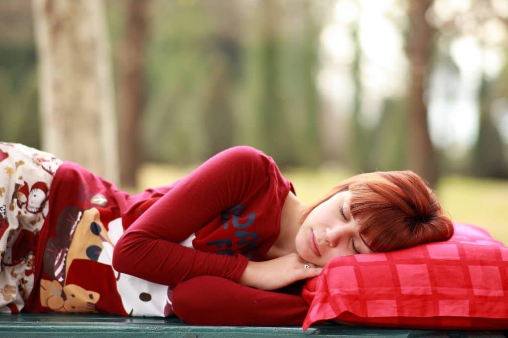 Woman sleeping outside