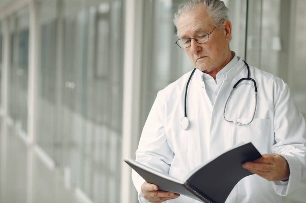 Doctor reviewing patient file