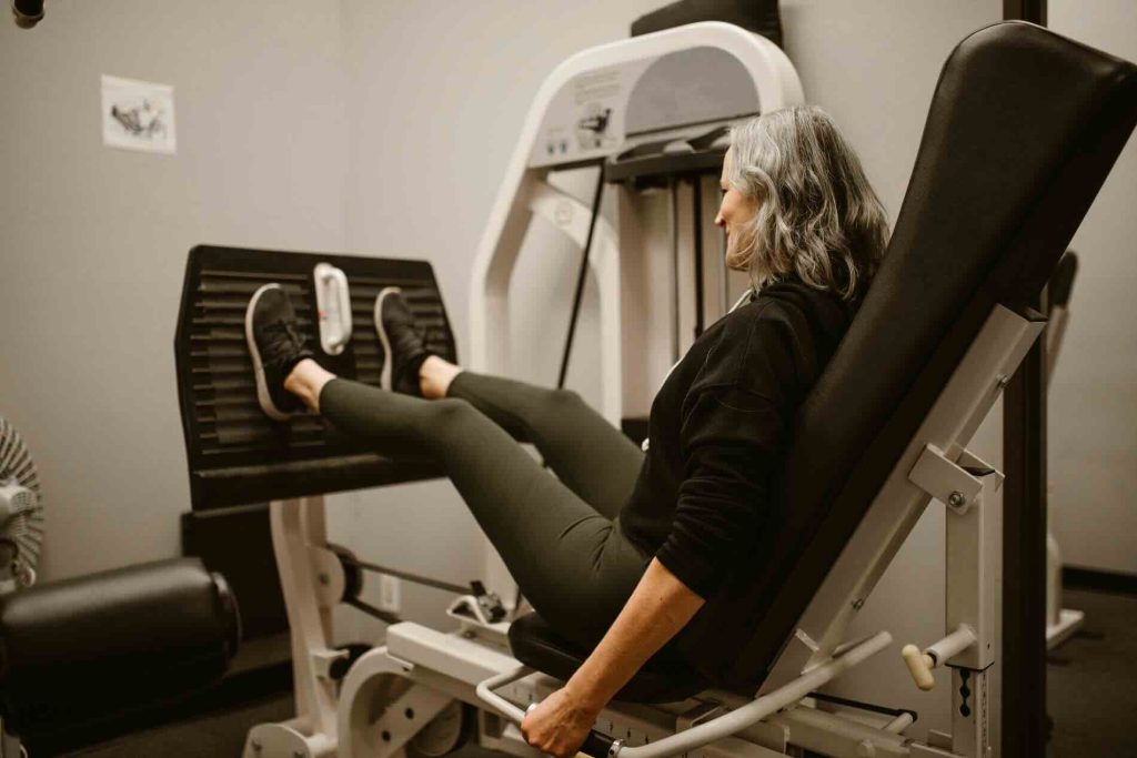 Woman doing leg press exercises