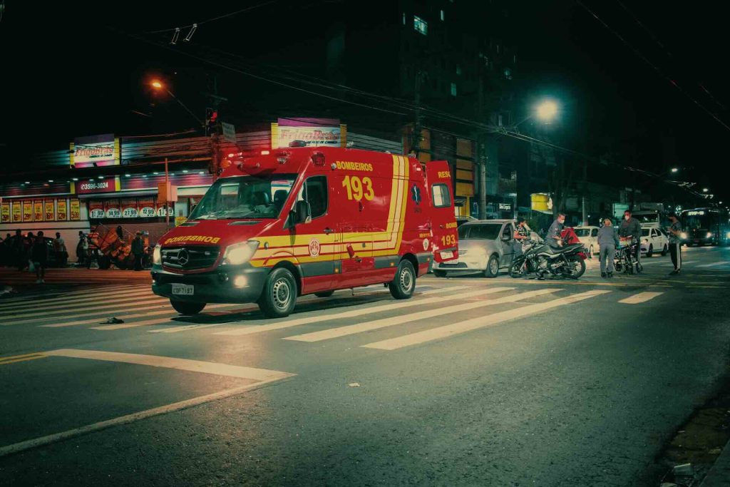 Ambulance on a road at night